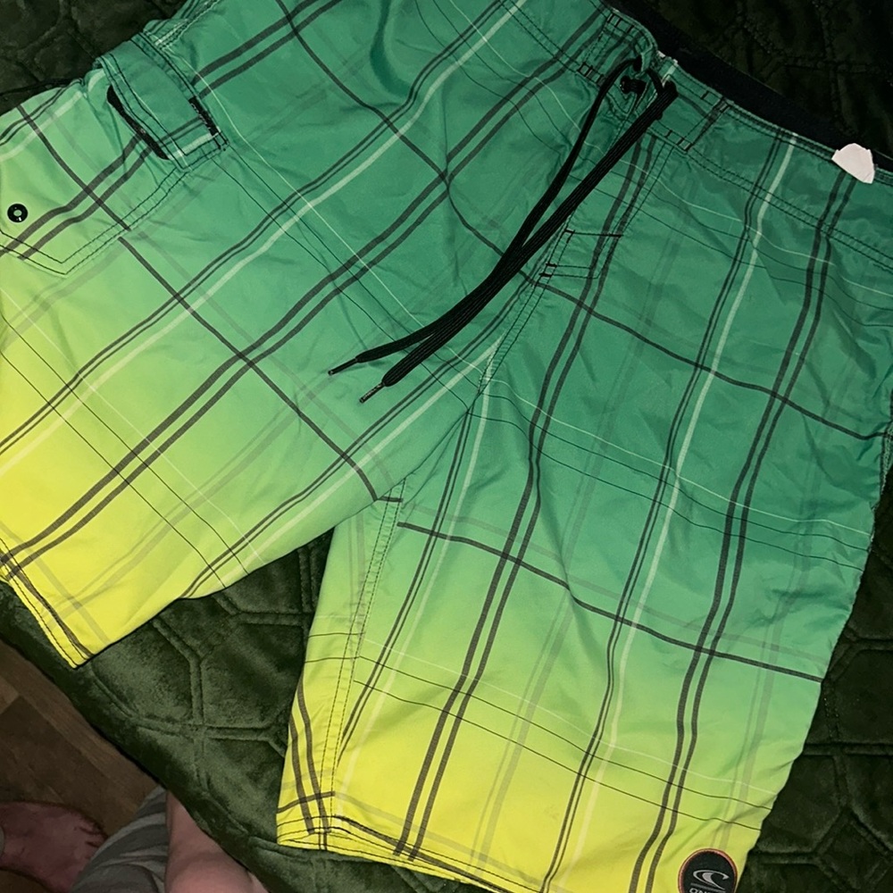 O’Neill green and yellow board shorts